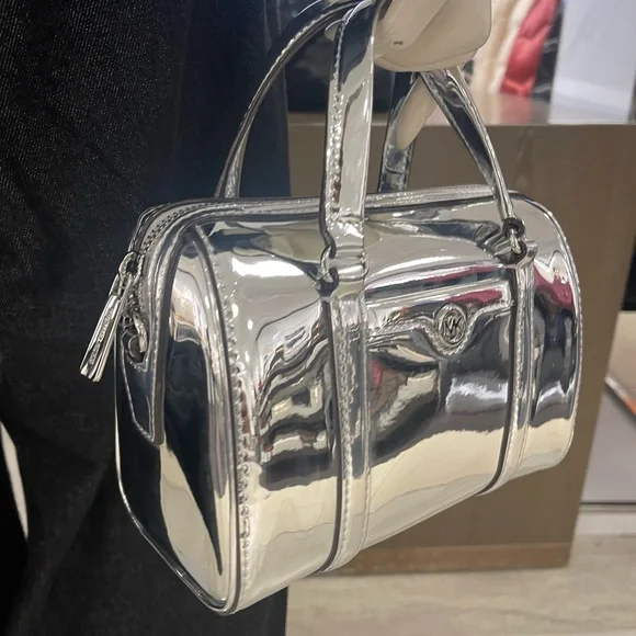 MICHAEL KORS Jet Set Small Patent Duffel Xbody Crossbody Bag
Silver 
NWT - Picture 5 of 16